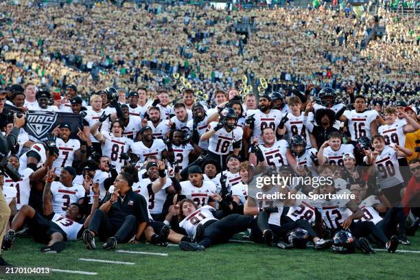 Northern Illinois Huskies celebrate the upset victory against the Notre Dame Fighting Irish on September 7 at Notre Dame Stadium in South Bend,...