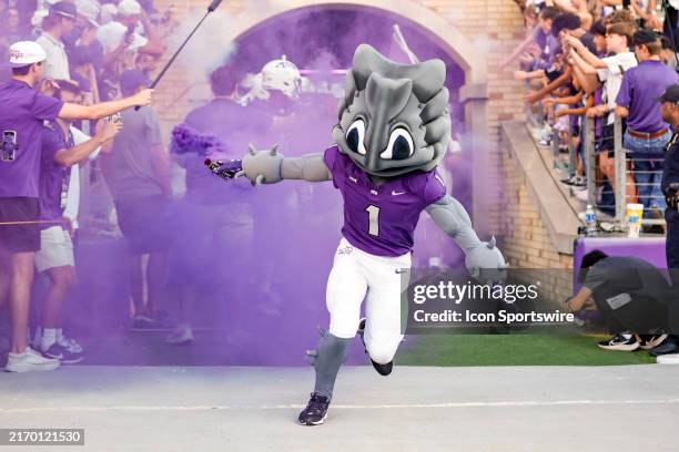 The TCU Horned Frogs mascot runs onto the field from the tunnel before the game between the TCU Horned Frogs and the Long Island Sharks on September...