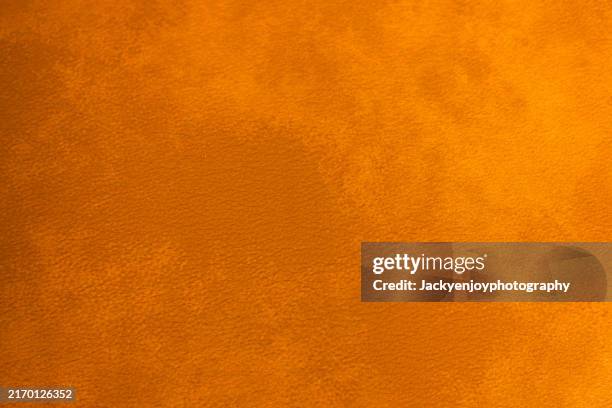 background with a seamless cow suede texture - cowhide stock pictures, royalty-free photos & images