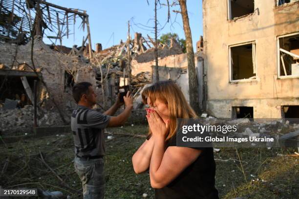 Woman reacts at the site of a Russian missile strike on September 4, 2024 in Lviv, Ukraine. The Russian army carried out large-scale missile attack...