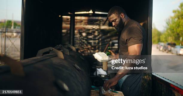 food truck owner holding takeout container and bottle - smokehouse stock pictures, royalty-free photos & images