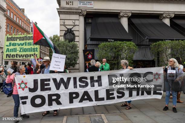 Members of the Jewish community assemble with banners to take part in the 18th National March for Palestine demonstration on 7th September 2024 in...