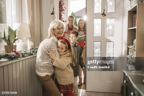 christmas spirit at home - social gathering stock pictures, royalty-free photos & images