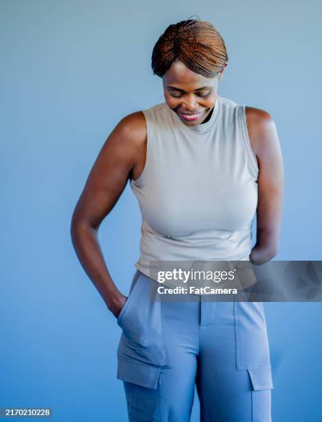 female amputee portrait - body positive stock pictures, royalty-free photos & images