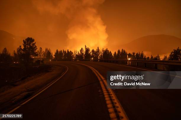 The Line Fire slows for the evening after a sudden a late-season monsoon rain storm temporarily halted its 4,000-foot elevation climb up to the edge...