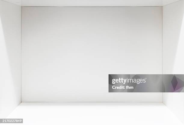 empty compartment in a white shelf - bücherregal leer stock-fotos und bilder