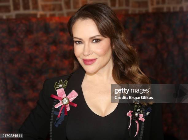 Alyssa Milano poses at a photo call for her joining the cast of the musical "Chicago" on Broadway at The Civilian Hotel Rosevale Cocktail Room on...