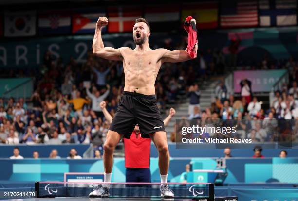 Patryk Chojnowski of Team Poland celebrates after winning the Para Table Tennis Men's Singles- MS10 Gold Medal Match on day seven of the Paris 2024...