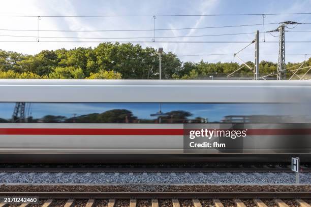 fast passing german high speed train "ice" - europese cultuur stockfoto's en -beelden