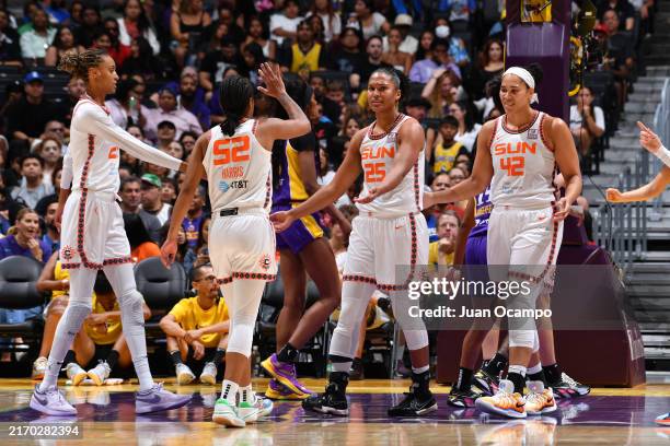 The Connecticut Sun high five during the game against the Los Angeles Sparks on September 8, 2024 at Crypto.com Arena in Los Angeles, California....