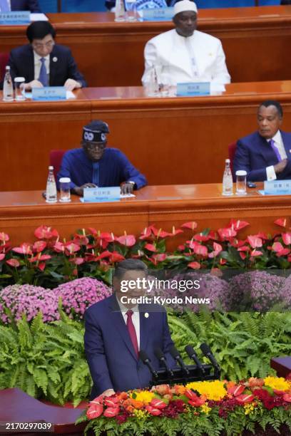 Chinese President Xi Jinping addresses the opening ceremony of a summit of the Forum on China-Africa Cooperation at the Great Hall of the People in...