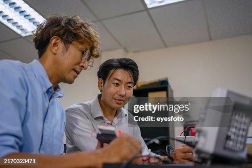 Engineer work with electronic component at workshop. Engineer work with electronic component at workshop.
