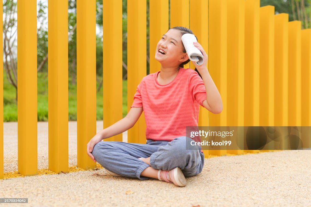 Girl holding the book