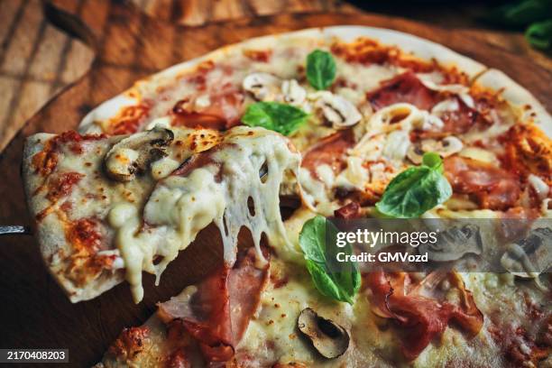 pizza with prosciutto cotto ham and mushrooms - pizza stock pictures, royalty-free photos & images