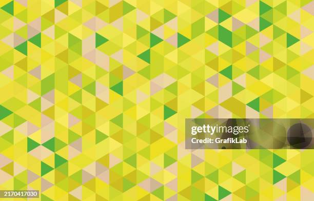 vibrant geometric pattern with yellow and green triangles - phone perspective stock illustrations
