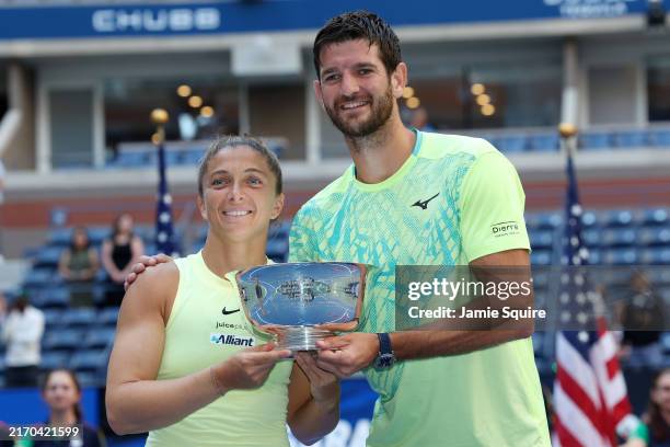 Sara Errani and Andrea Vavassori of Italy pose with their trophy after defeating Taylor Townsend and Donald Young of the United States in their Mixed...