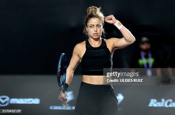 Mexico's Renata Zarazua reacts after winning set against Ukraine's Anhelina Kalilnina during their women's singles round of 16 match of the WTA 2024...
