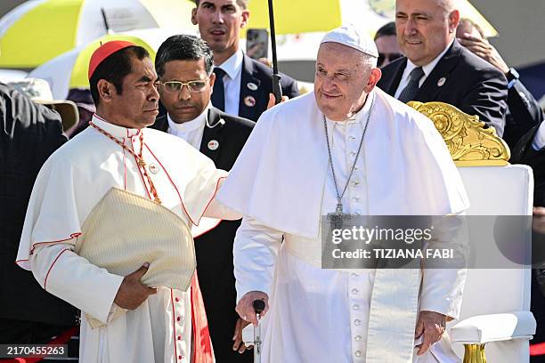 Pope Francis attends a mass at the Esplanade of Tasitolu in Dili, East Timor, on September 10, 2024.