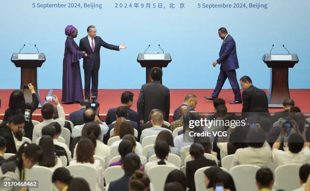 China's Foreign Minister Wang Yi , Senegal's Foreign Minister Yassine Fall and Congo's Foreign Minister Jean-Claude Gakosso attend a joint press...