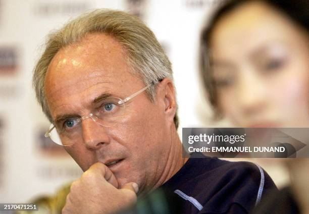 England's national soccer team coach Sven-Goran Eriksson addresses a press conference next to a South Korean translator 22 May 2002 on the South...
