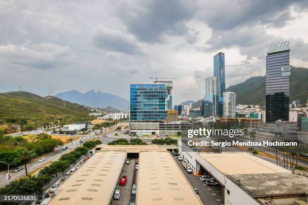 cityscape of the city of monterrey, mexico on a cloudy day - monterrey aerial stock pictures, royalty-free photos & images