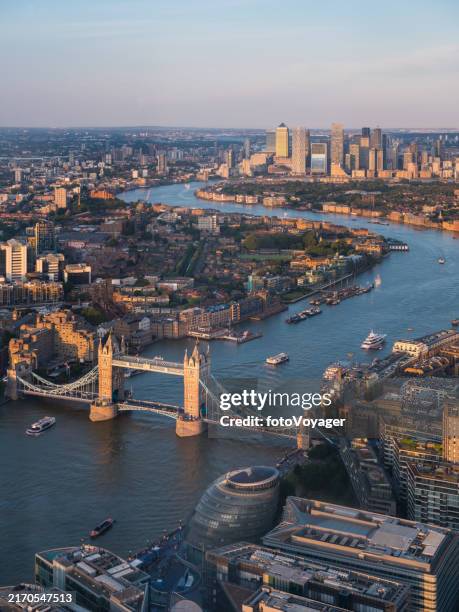 london aerial photograph tower bridge canary wharf thames sunset cityscape - river thames stock pictures, royalty-free photos & images