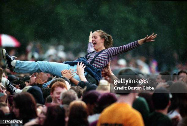 Boston, MA A concert-goer crowd surfs during Green Day's performance at the Hatch Shell in 1994.