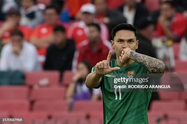 Bolivia's forward Carmelo Algarañaz celebrates scoring his team's first goal during the 2026 FIFA World Cup South American qualifiers football match...