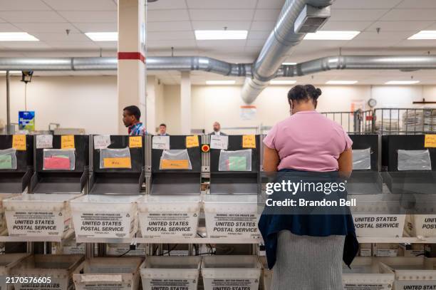 Service Center employee sorts and processes mail at the IRS Processing Facility on September 06, 2024 in Austin, Texas. U.S. Secretary of the...