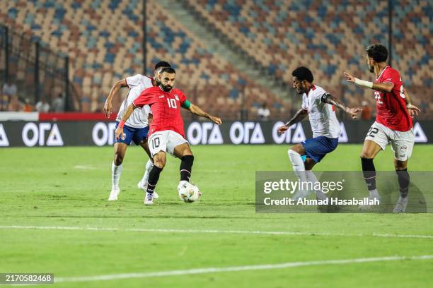 Egyptian national team player Mohamed Salah challenges Cape Verde national team player in action during the AFCON Morocco 2025 qualifier match...