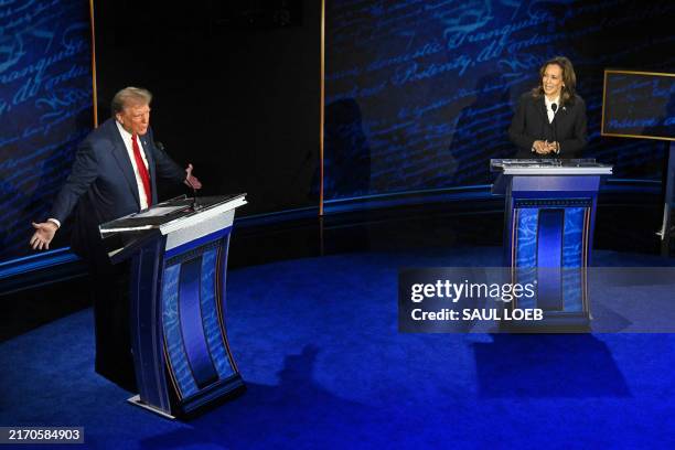 Former US President and Republican presidential candidate Donald Trump speaks during a presidential debate with US Vice President and Democratic...