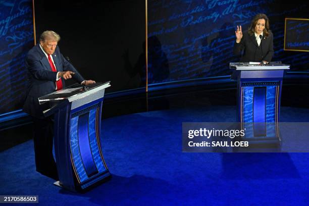 Former US President and Republican presidential candidate Donald Trump speaks during a presidential debate with US Vice President and Democratic...