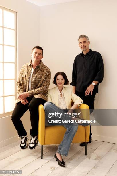 Orlando Bloom, Caitriona Balfe and John Turturro of 'The Cut' pose in the Getty Images Portrait Studio Presented by IMDb and IMDbPro during the...