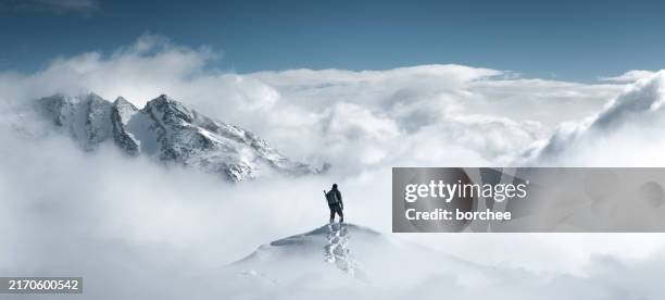mountain hiker - snowy mountain top stock pictures, royalty-free photos & images