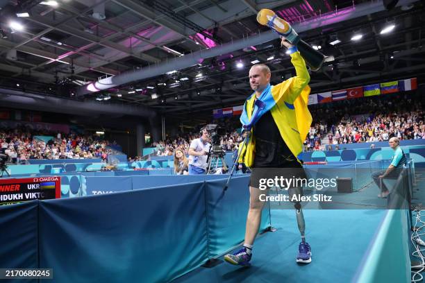 Viktor Didukh of Team Ukraine reacts after defeating Shuai Zhao during the Men's Singles MS8 gold medal match on day ten of the Paris 2024 Summer...