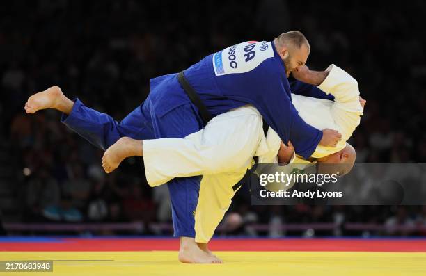Wilians Silva de Araujo of Team Brazil and Ion Basoc of Team Republic of Moldova compete during the Men's +90kg J1 Final on day ten of the Paris 2024...