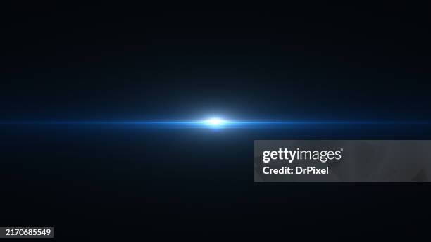 blue light with lens flare - reflejo fotografías e imágenes de stock
