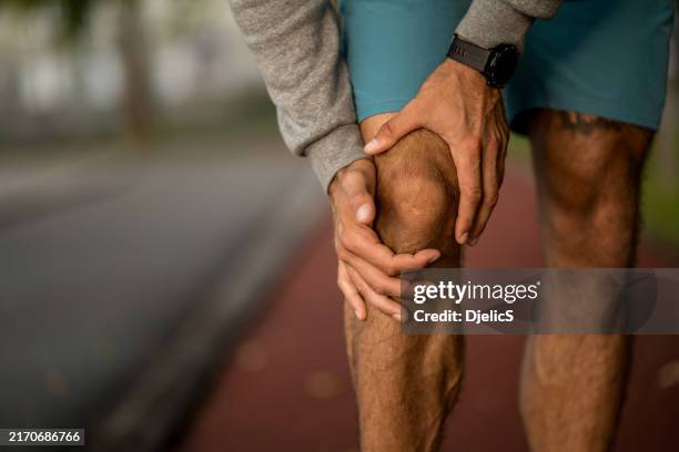 knee injury. - knee stock pictures, royalty-free photos & images