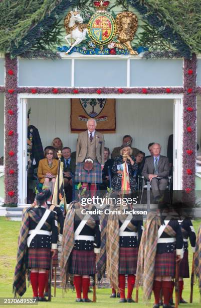 King Charles III, Queen Camilla and Richard Scott 10th Duke of Buccleuch attend The Braemar Gathering 2024 at The Princess Royal and Duke of Fife...