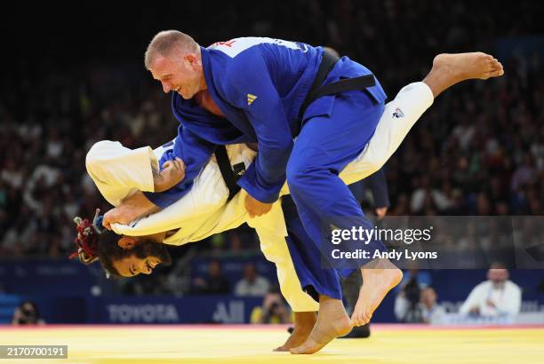Hélios Latchoumanaya of Team France attempts to throw Oleksandr Nazarenko of Team Ukraine during the Men's Para Judo 90kg-J2 Gold Medal Match on day...