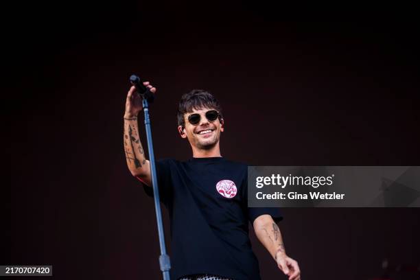 British singer Louis Tomlinson of the former band One Direction performs live on stage during day 1 of Lollapalooza 2024 at Olympic Stadium on...