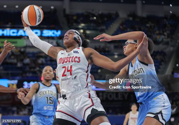 Aaliyah Edwards of the Washington Mystics grabs the rebound during the second half of a WNBA game against the Chicago Sky on September 2024 at...