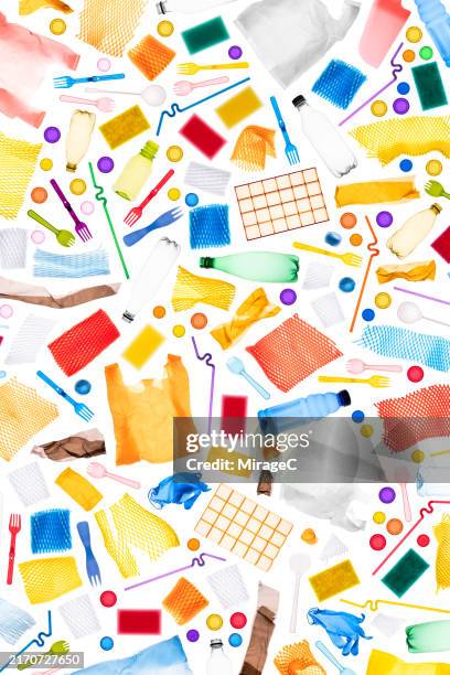 multi colored plastic garbage - plastic folie stockfoto's en -beelden