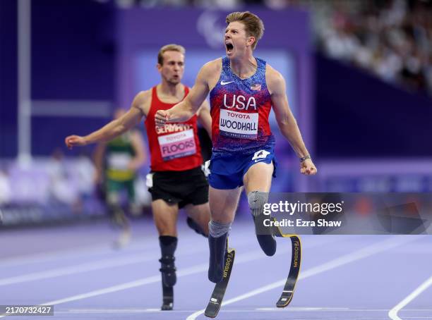 Hunter Woodhall of Team United States competes against Johannes Floors of Team Germany during the Men's Para Athletics 400m T62 Final Race on day...