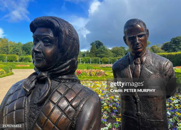 Bronze sculpture depicting Britain's late Queen Elizabeth II and Prince Philip, Duke of Edinburgh, created by artist Anto Brennan, is pictured in...