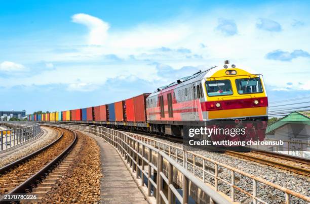 freight train container loading container to port - güterzug stock-fotos und bilder