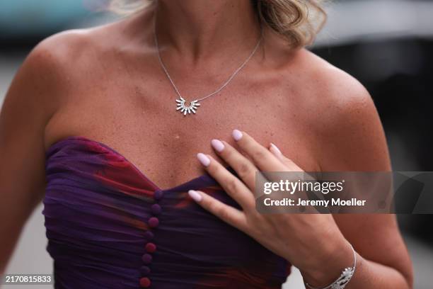 Olga Ferrara seen wearing Leibish diamond necklace / diamond bracelet, Hutch pink / purple pattern bandeau pleated long dress, on September 07, 2024...