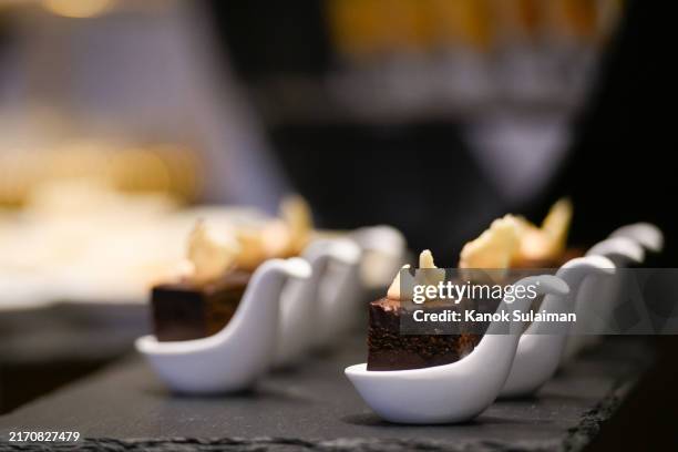 chocolate cakes ready for party guests - chocolate tasting stock pictures, royalty-free photos & images