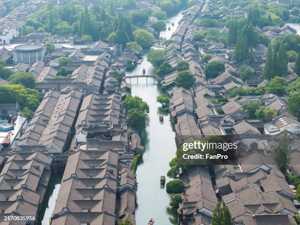 wuzhen, jiaxing, zhejiang, china, aerial view of small bridges and flowing water, chinese style town in spring - hangzhou river stock pictures, royalty-free photos & images