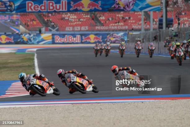 Valentin Perrone of Argentina leads the field during the Red Bull MotoGP Rookies Cup 2024 race 2 during the MotoGP Of San Marino - Race at Misano...